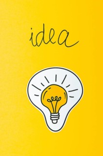 Light bulb idea concept yellow background