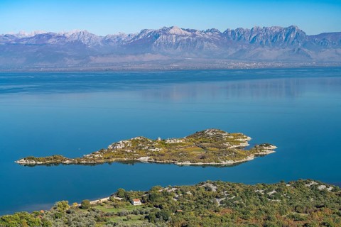 View over Lake Scutari with the island of Beska near the village of Donji Murici