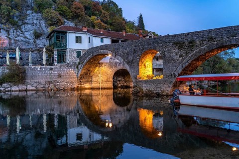 The Old Bridge Stari Most over the Crnojevic River in Rijeka Crnojevica at dusk