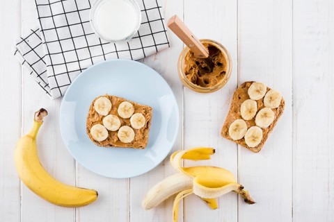 Top view tasty breakfast with organic fruits
