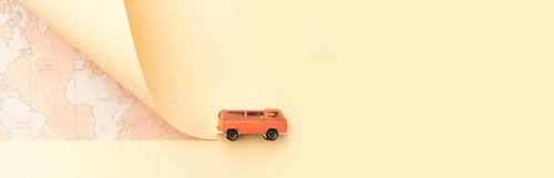 Travel concept with map toy van