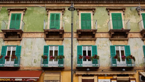 Pale green house front