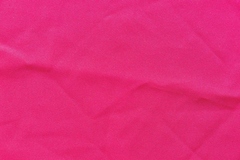 Full frame pink fabric background