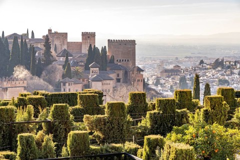 View from the Generalife of the Alhambra castle complex and the city of Granada