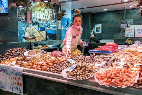 Saleswoman at the seafood stall