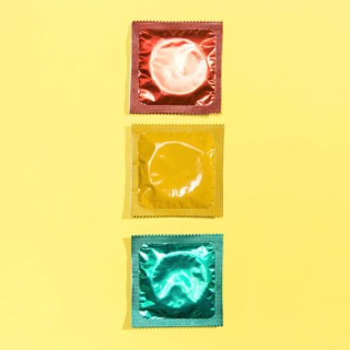 Top view red yellow green condoms