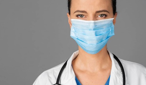 Female doctor hospital wearing mask