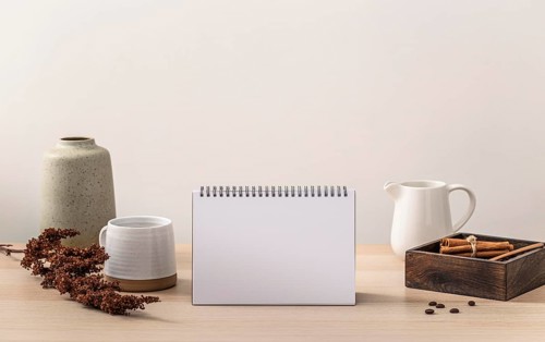 Front view table calendar coffee mug