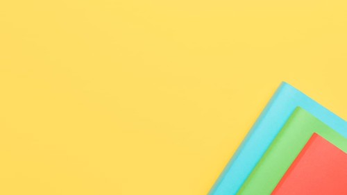 Yellow background with paper sheets corner