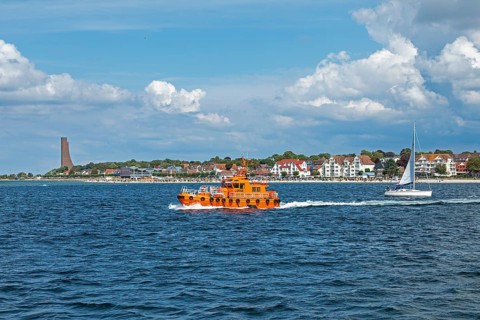 Pilot boat and sailboat off Laboe