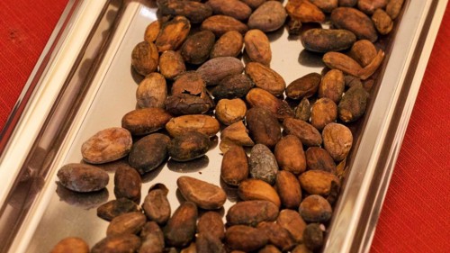 Chocolate beans on silver tray