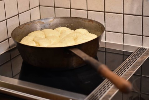 Preparation of steam noodles in rustic old steam noodle pan