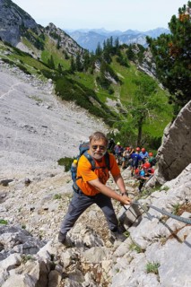 Climbers on the Widauersteig via ferrata at Scheffauer