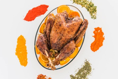 Baked chicken with flavourings white table