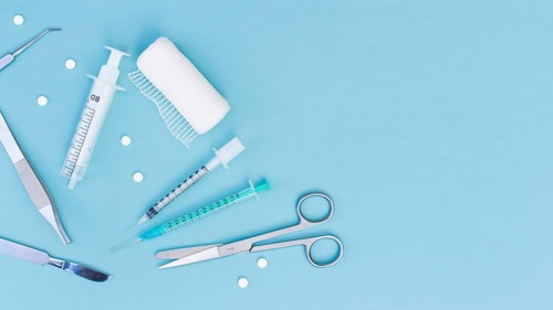 Overhead view medical equipment s blue background