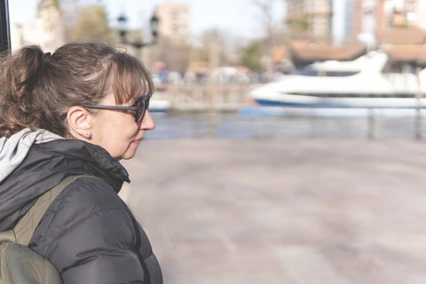 Portrait of a tourist walking along Paseo Victorica