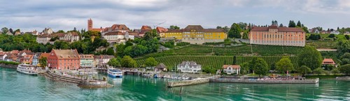 Town view of Meersburg on Lake Constance with landing stage and excursion boats