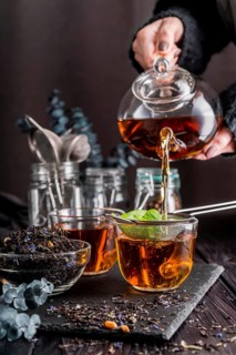Pouring tea cup
