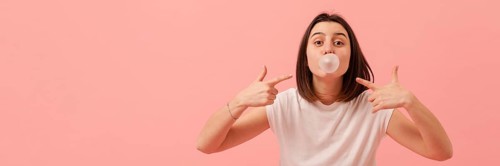 Girl pointing bubble gum