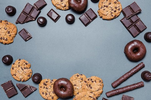 Top view circular frame with chocolate candies