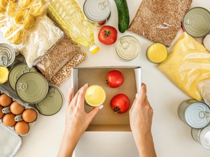 Flat lay fresh provisions donation with box
