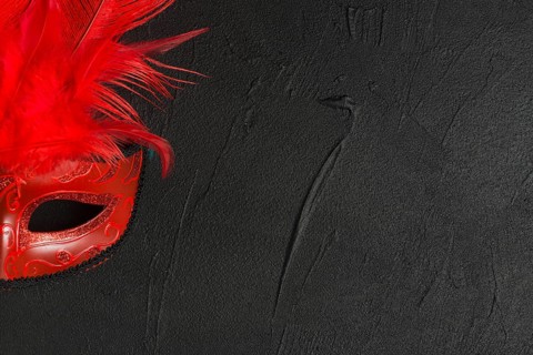 Red mask dark table