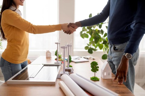 Colleagues handshake close up