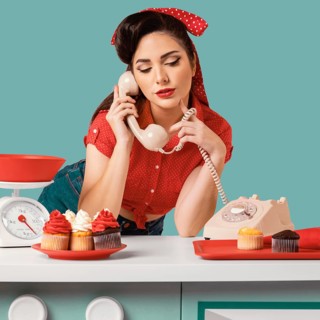 Pinup girl posing kitchen