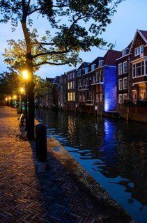 Gracht with old houses in the blue hour in Dordrecht