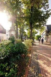 Cyclists in the old town of Monheim am Rhein