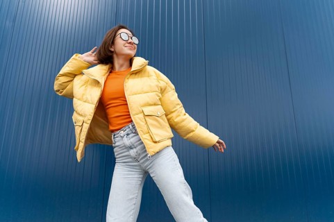 Portrait young woman jumping