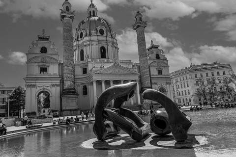 Bronze sculptures in the pond in front of the baroque Karlskirche