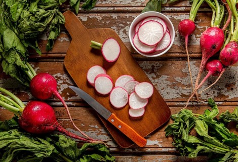 Top view radishes with knife