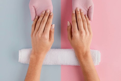 Manicurist holding hands