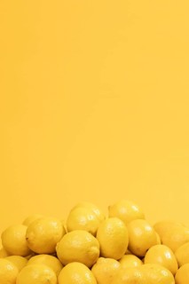 Bunch raw lemons with copy space