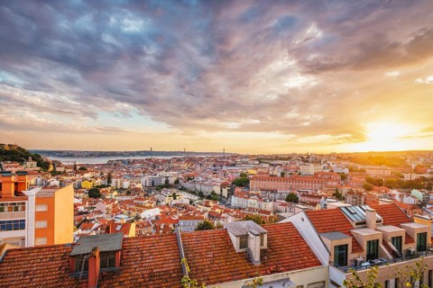 View of Lisbon famous view from Miradouro da Senhora do Monte tourist viewpoint of Alfama and Mauraria old city district
