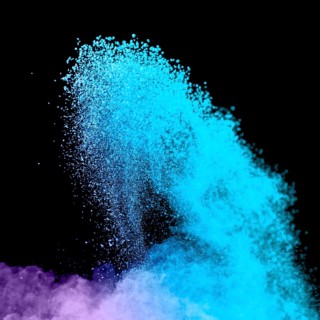 Blue burst powder dark background