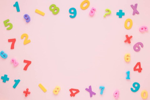 Colourful math numbers letters frame with copy space top view