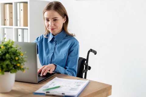 Portrait cute adult woman working laptop