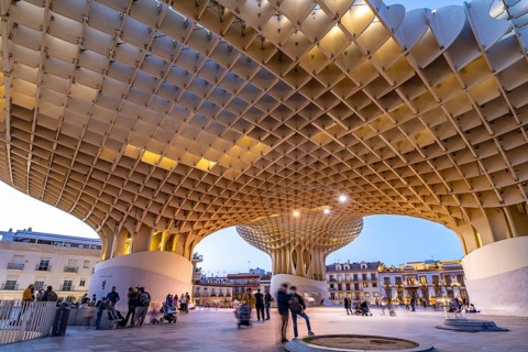 The futuristic wooden construction and observation deck Metropol Parasol at the Plaza de la Encarnacion at dusk