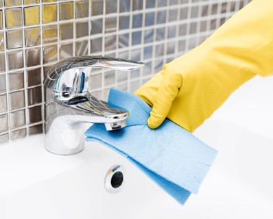Sink faucet getting cleaned