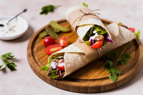 Arabic kebab sandwich wooden board high view