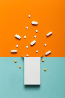 Top view pills coming out box