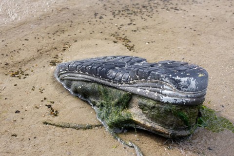 Old shoe on the beach