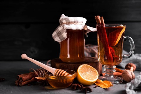 Tea honey black background