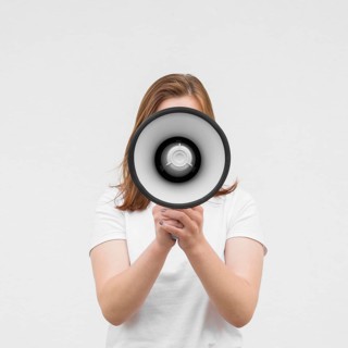 Front view girl screaming megaphone