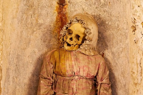 Standing mummy of a little girl