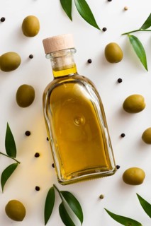 Olives oil bottle table