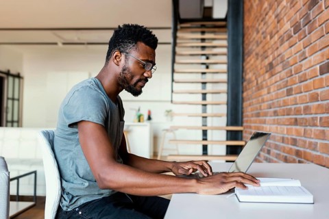 Medium shot man working desk