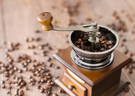 Close up coffee beans with grinder